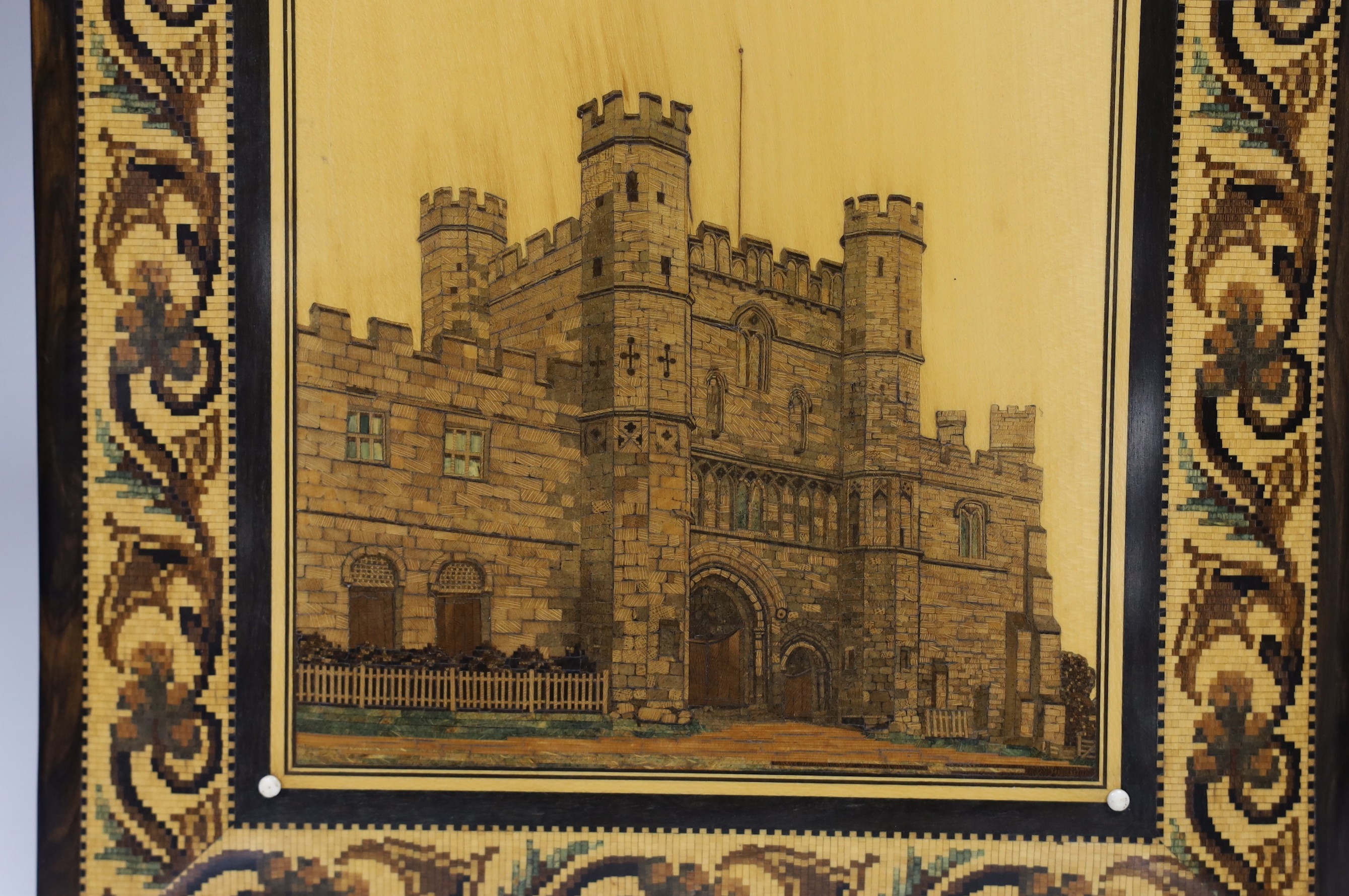 A rare Tunbridgeware rosewood coromandel blotter pad, with gauge-work view of Battle Abbey gateway, 29cm